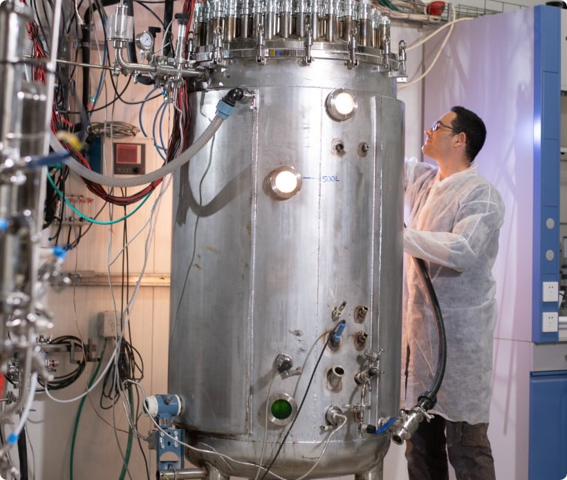 Brevel's technology - researcher working with bioreactors